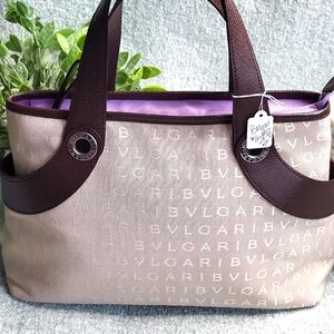 Like New Bvlgari Logomania Satchel W/Leather Accents Silvertone Grommets